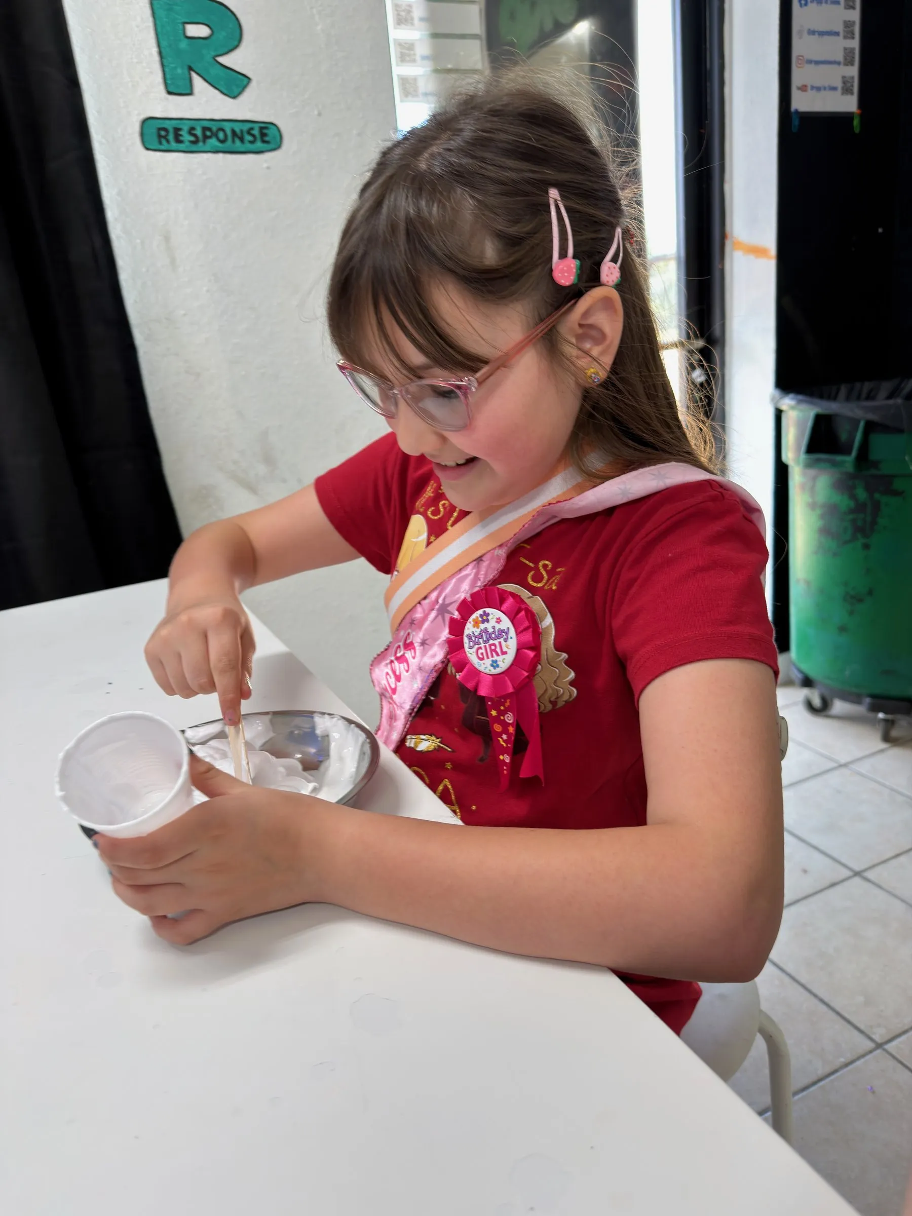 A mentee making slime at a birthday outing